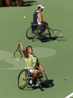 Esther Vergeer and Maaike Smit of the Netherlands in action during the womens Doubles Final Wheelchair Tennis during the 2000 Paralympic Games.  Nick Wilson/Allsport